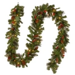 Pre-Lit Artificial Christmas Garland, Green, Crestwood Spruce, White Lights, Decorated With Pine Cones, Berry Clusters, Battery Operated, Christmas Collection, 9 Feet