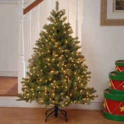Pre-Lit 'Feel Real' Artificial Full Downswept Christmas Tree, Green, Douglas Fir, White Lights, Includes Stand, 4.5 Feet -National Tree Company Downswept Douglas3 e1d20d84 72cf 422f b9ba 942e101547f3
